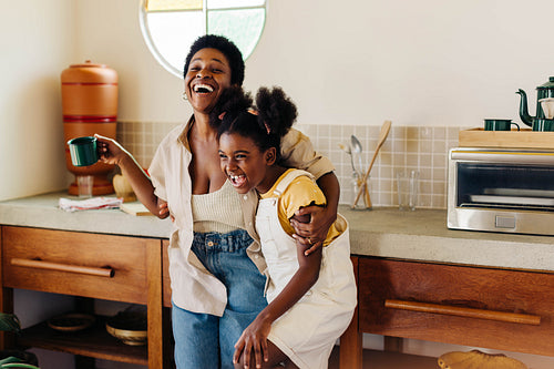 Family enjoying a cheerful breakfast moment in a brazilian kitchen