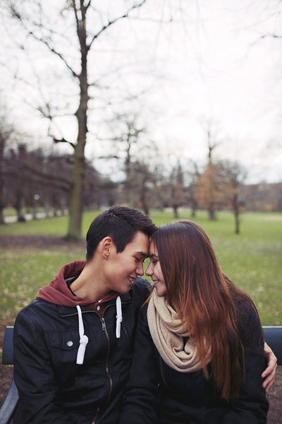 Teenage couple enjoying a day in the park