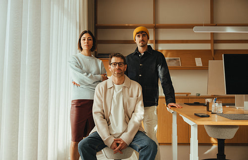 Startup team portrait in a bright office