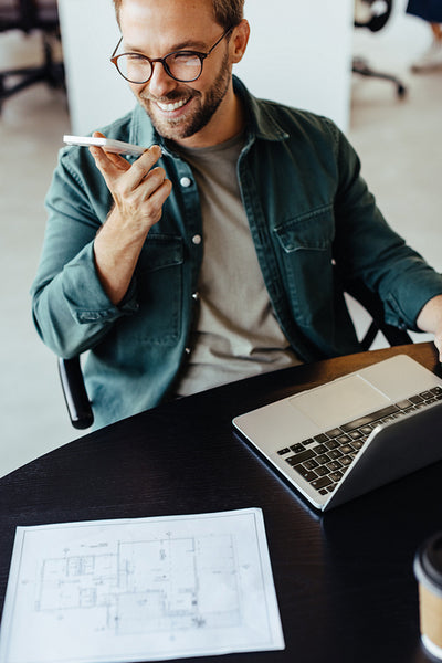 Male architect discussing a new project on a phone call