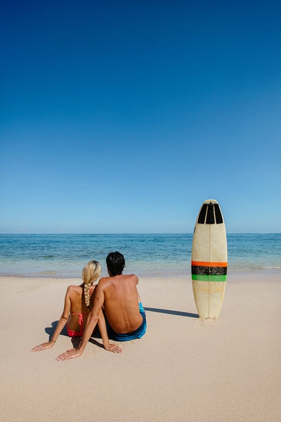 Young couple resting on the beach