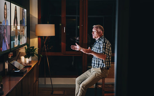 Entrepreneur having a online meeting with team