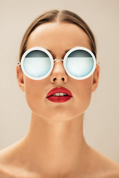 Beautiful young woman wearing sunglasses