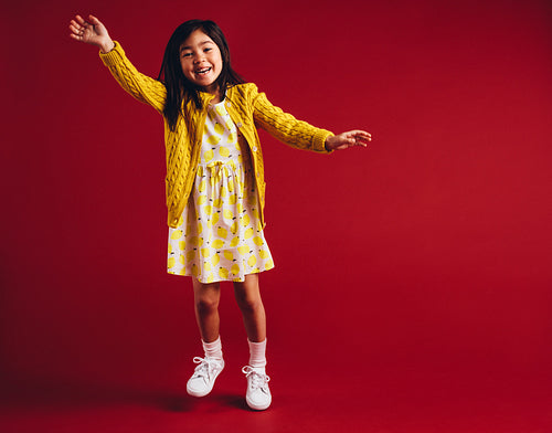 Happy kid waving good bye