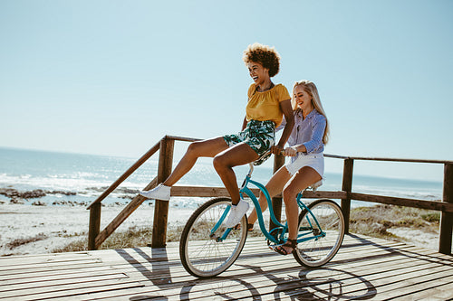Girls having a great fun on bike