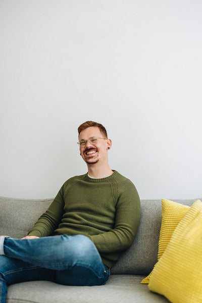 Male business professional looking happy