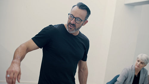 Businessman briefing his team