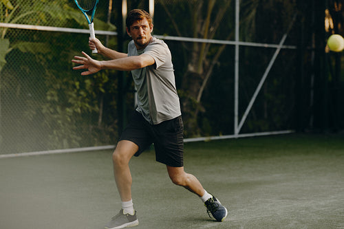 Tennis player on vacation at a luxury resort