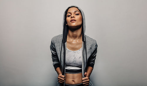 Fit woman wearing a hoodie sportwear