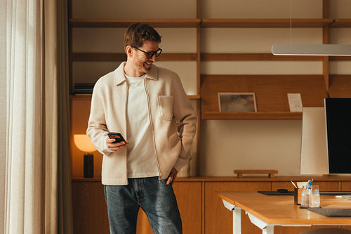 Contemporary office life: man at work in a modern workspace