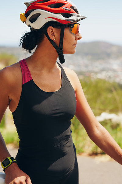 Female cyclist looking away