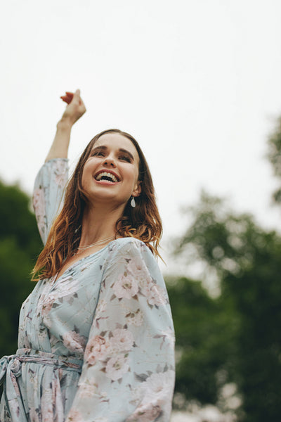 Beautiful young woman enjoying outdoors