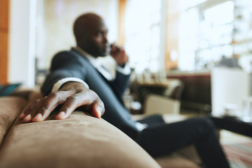 Businessman waiting on hotel reception