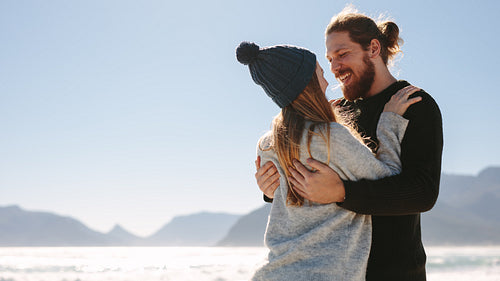 Couple enjoying a lovely time on the beach