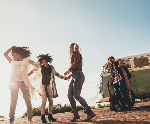 Group of friends enjoying vacation outdoors