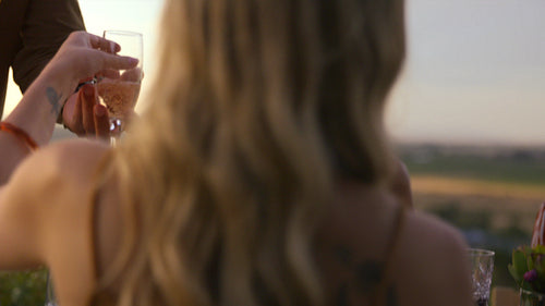 Serving champagne to friends