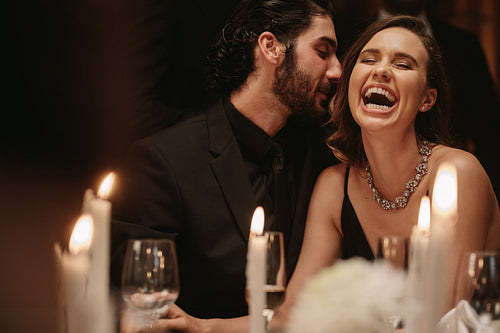 Loving couple having a fun at a gala dinner event