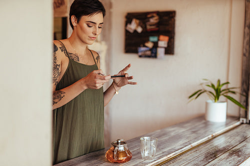 Woman taking photos for her blog