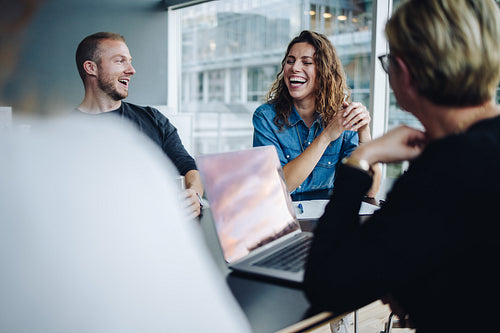 Smiling business team in boardroom meeting