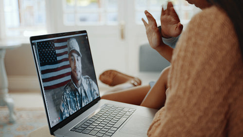 Deployed dad calls home from the military, he waves to his wife and kids on a video chat