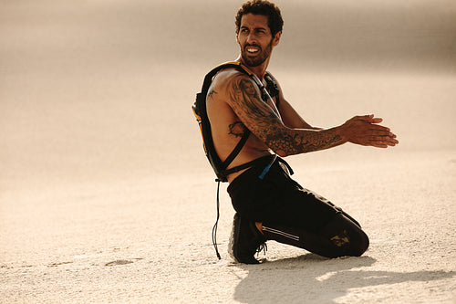 Fitness man taking break after training