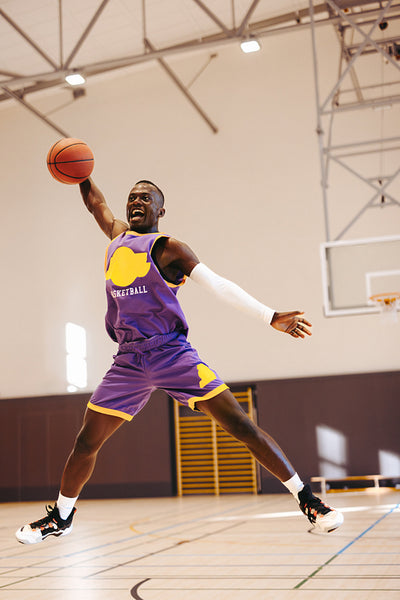 Upward momentum: Young player goes for the dunk