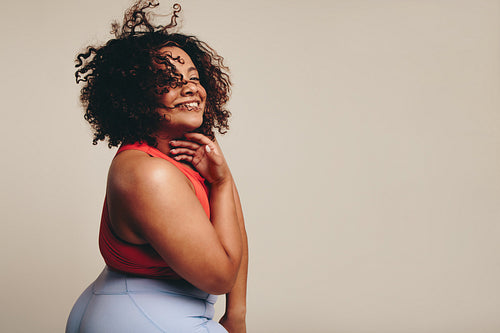 Fit woman dancing and having fun in sportswear