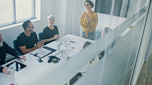 Business team clapping hands after a productive meeting