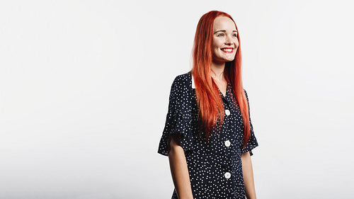 Smiling woman with reddish brown hair