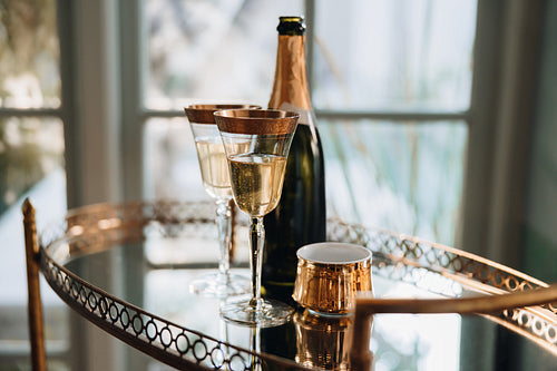 Alcoholic beverages placed on a glass table