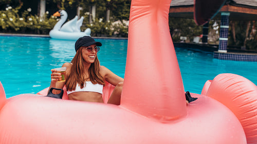 Woman enjoying at pool party