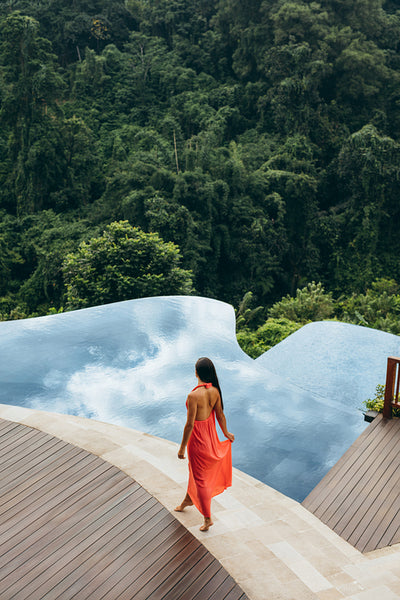 Woman near poolside of holiday resort