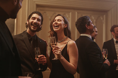 Happy group of friends enjoying at a party