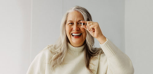 Vitamin supports senior woman with healthy aging