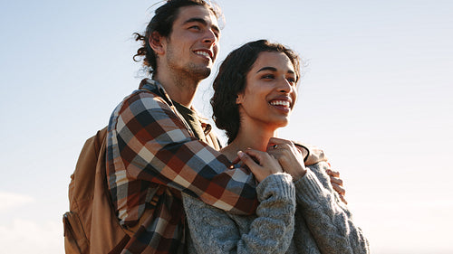 Loving couple looking at a view