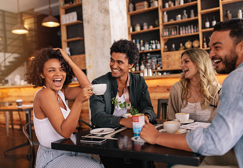 Group of friends enjoying coffee together