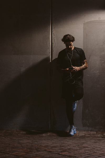 Sportsman relaxing during workout break