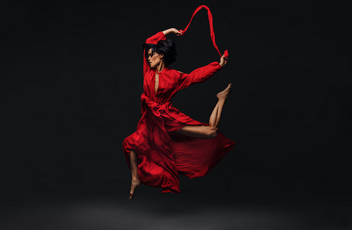 Contemporary female dancer dancing in studio