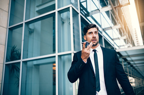 Travelling businessman making phone call