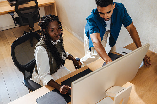 Young professionals collaborating at a modern architecture firm's office