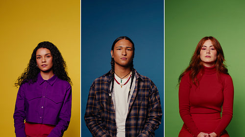 Three diverse young adults pose in colorful studio portraits against vibrant backgrounds