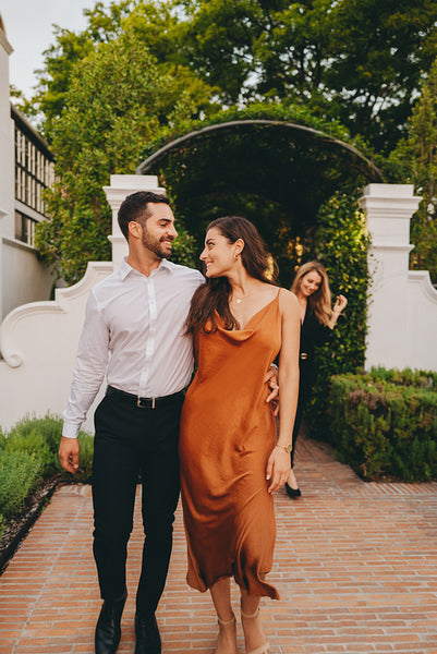 Romantic young couple arriving at a retreat