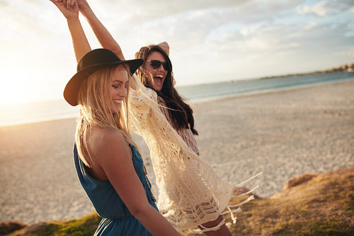 Female friends enjoying a day at sea coast