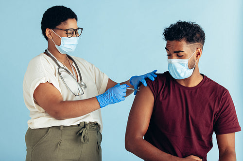 Man getting covid-19 vaccine