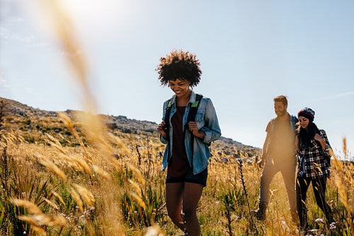 Group of people hiking in countryside