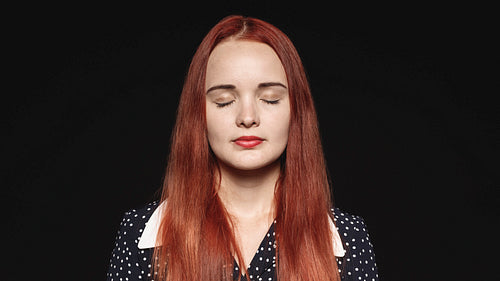 Caucasian woman with reddish brown hair