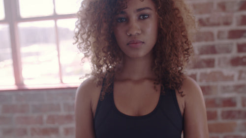 African woman at fitness studio