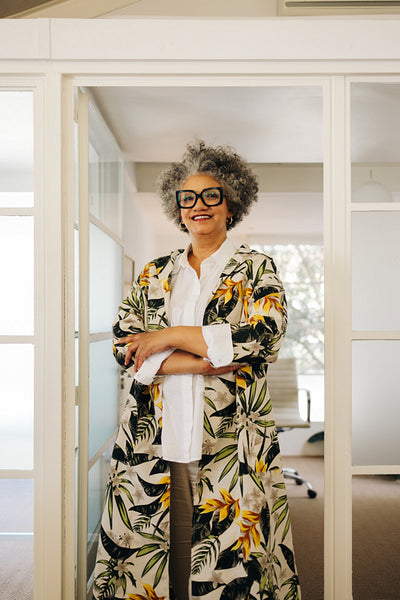 Senior businesswoman smiling at the camera in an office