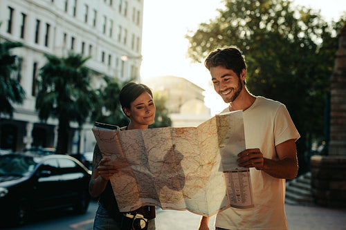 Tourist couple exploring the city 