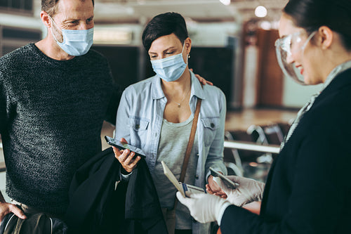 Documents checking at boarding gate of airport
